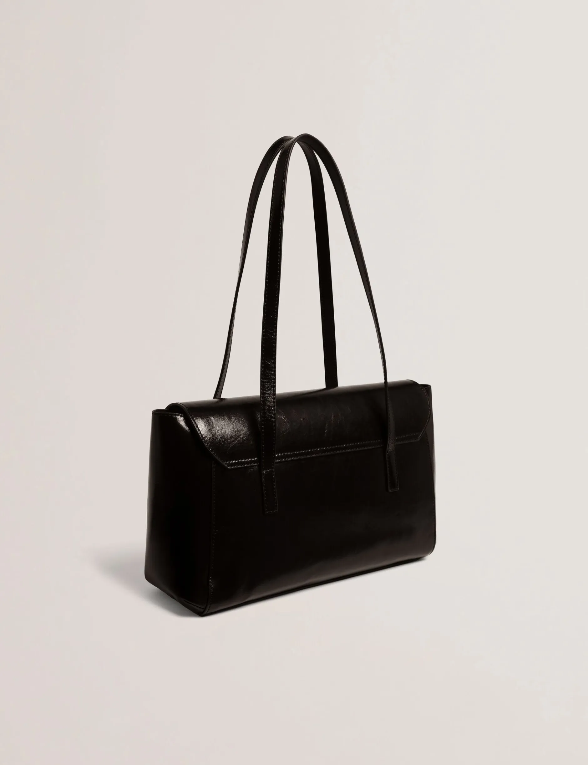 Baguette-Tasche aus geknittertem Leder mit Drehverschluss