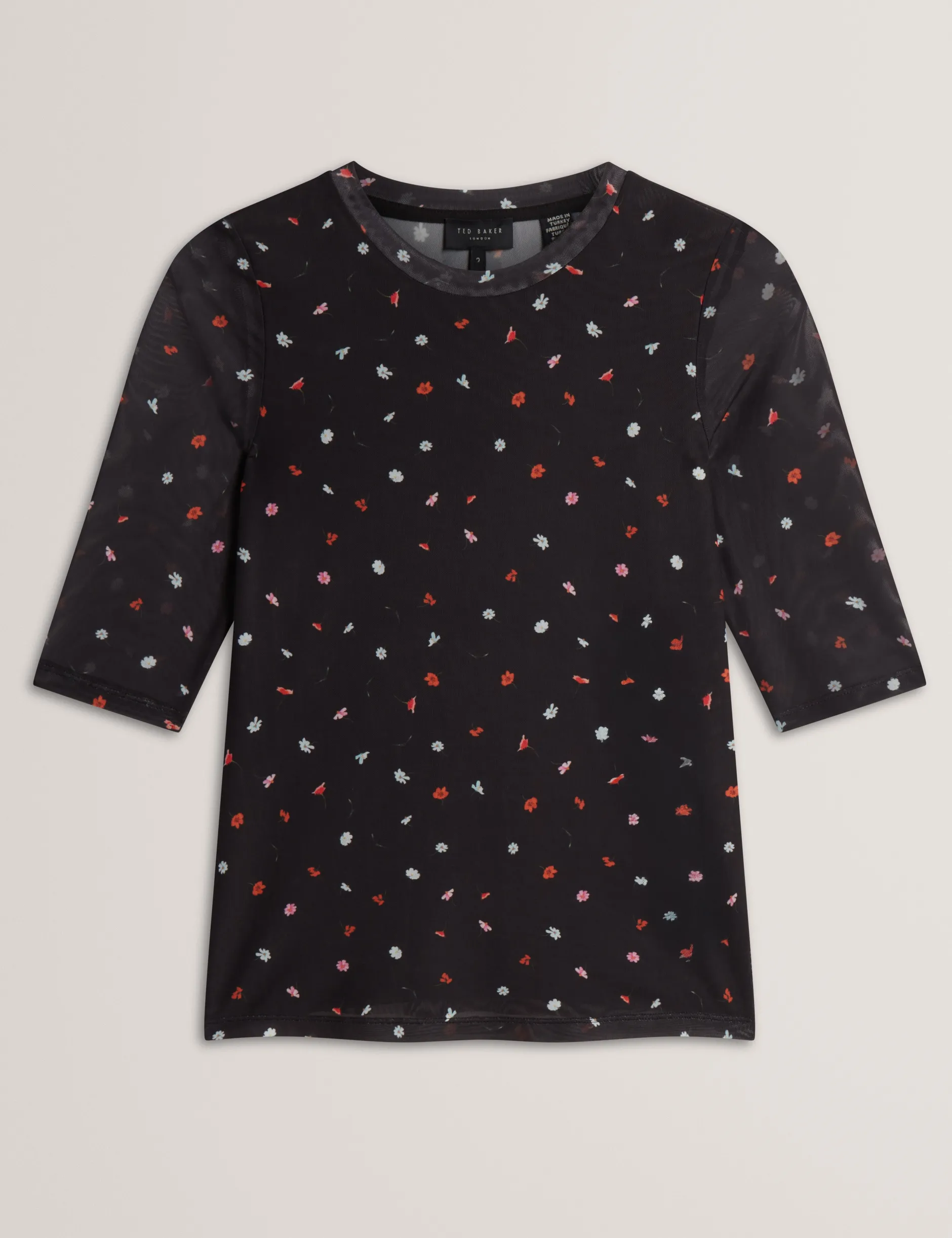 Enganliegendes Mesh-Top mit verstreutem Blumenmuster