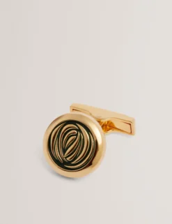 Goldene und grüne spiralförmige Manschettenknöpfe