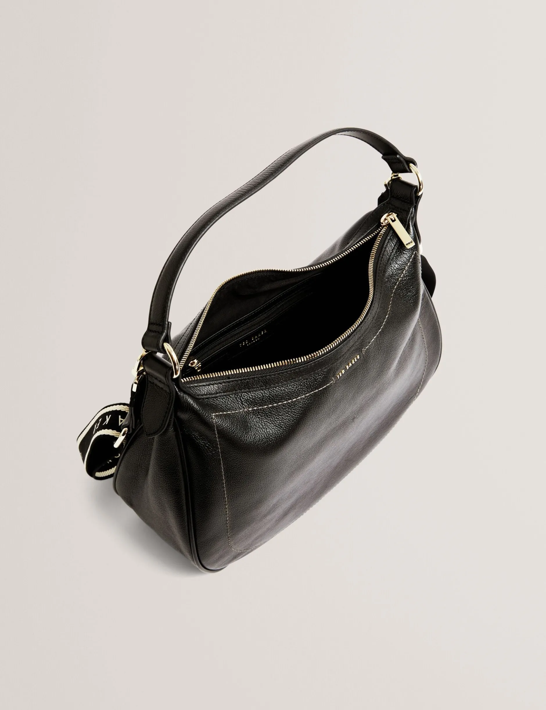Große Hobo-Tasche aus Leder mit Gurtband