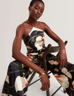 Jumpsuit mit Neckholder und weitem Bein im Nouveau-Print
