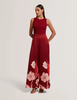 Jumpsuit mit Strickoberteil und geblümtem Hosenaufschlag
