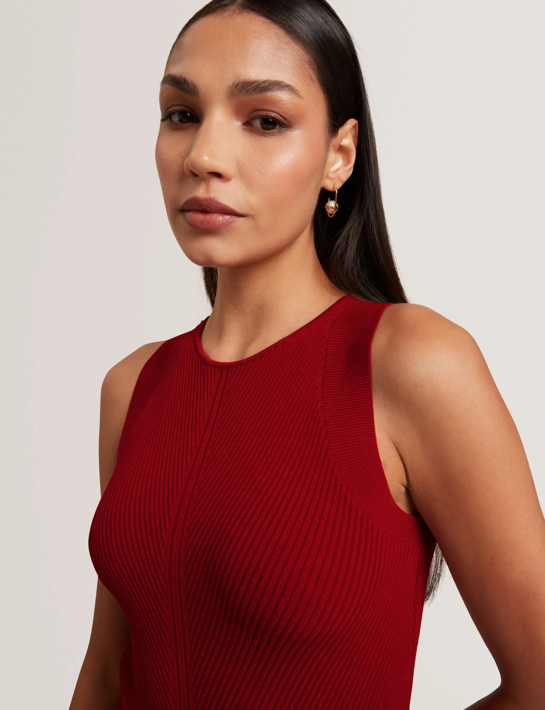 Jumpsuit mit Strickoberteil und geblümtem Hosenaufschlag