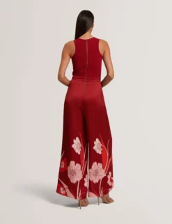 Jumpsuit mit Strickoberteil und geblümtem Hosenaufschlag