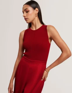 Jumpsuit mit Strickoberteil und geblümtem Hosenaufschlag