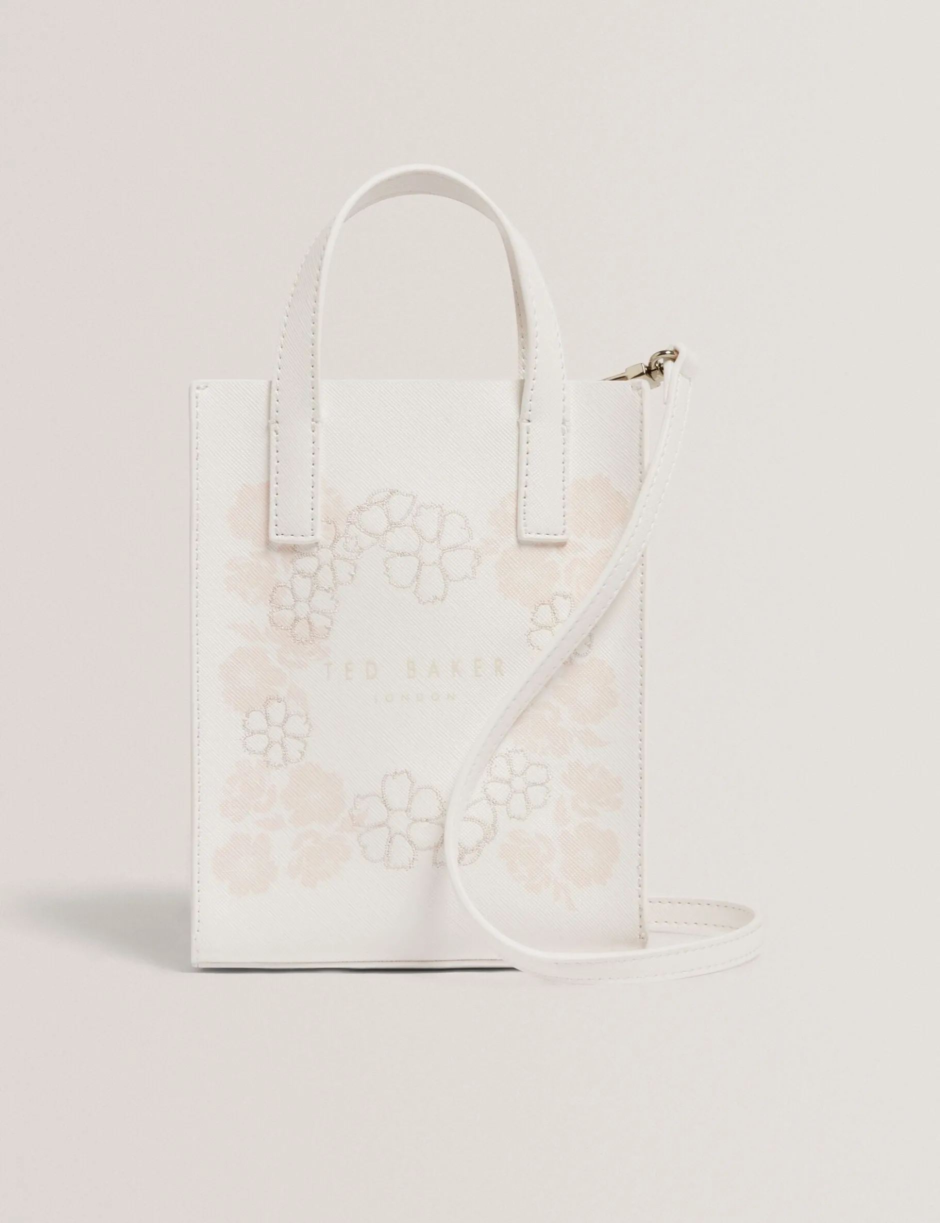 Kleine Tragetasche mit Blumenstickerei und Icon-Muster