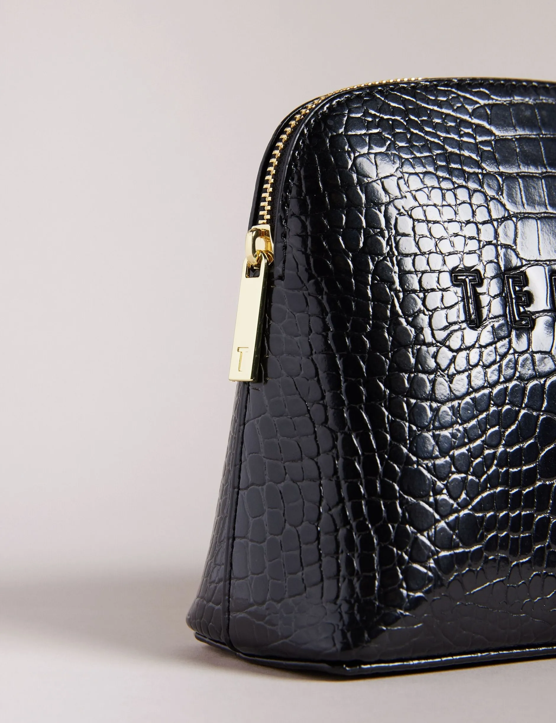 Kosmetiktasche aus Kunstleder in Kroko-Optik