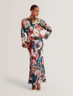 Maxikleid mit auffälligem Blumenmuster und Sanduhr-Schnitt