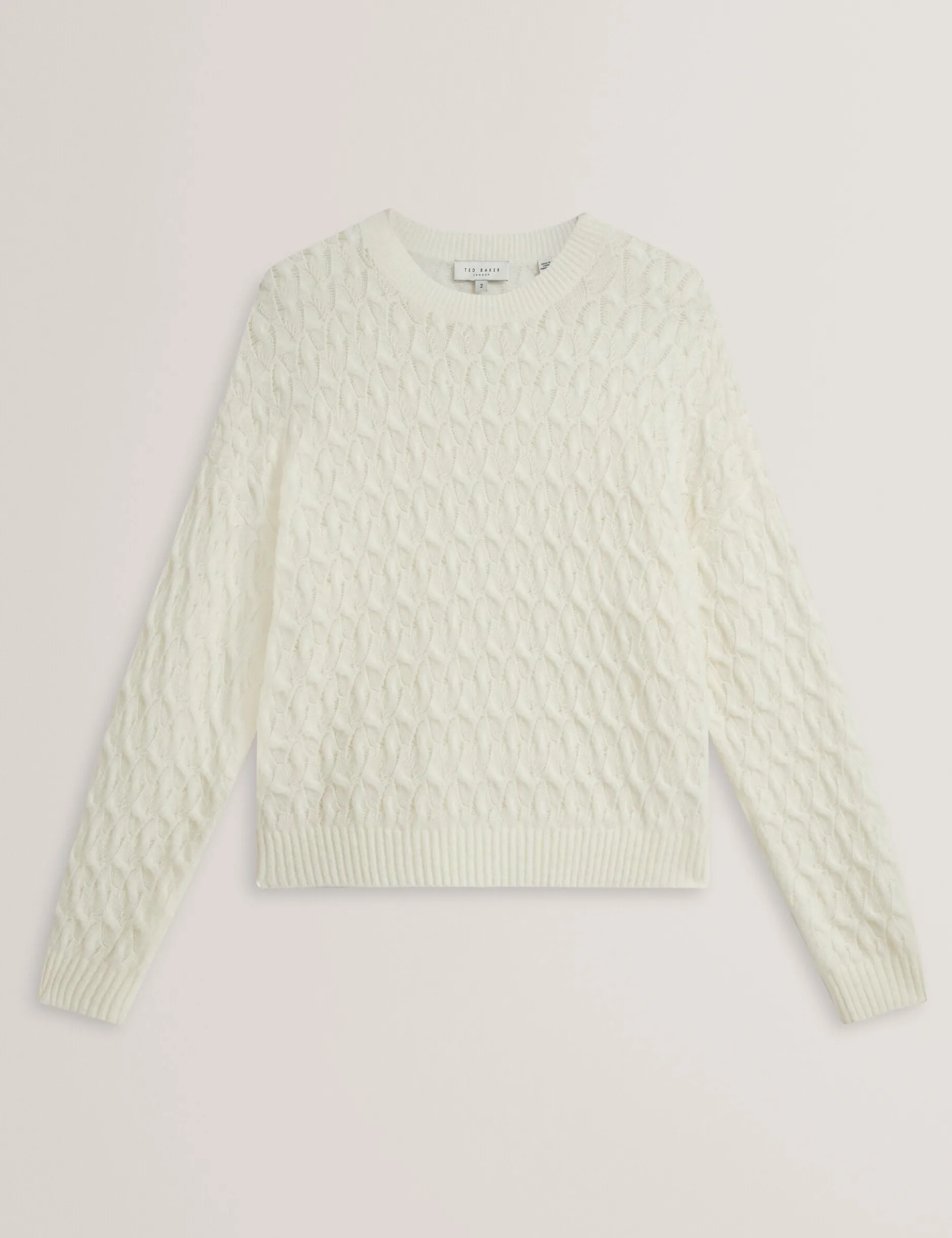 Pointelle Zopfstrickpullover aus Wolle