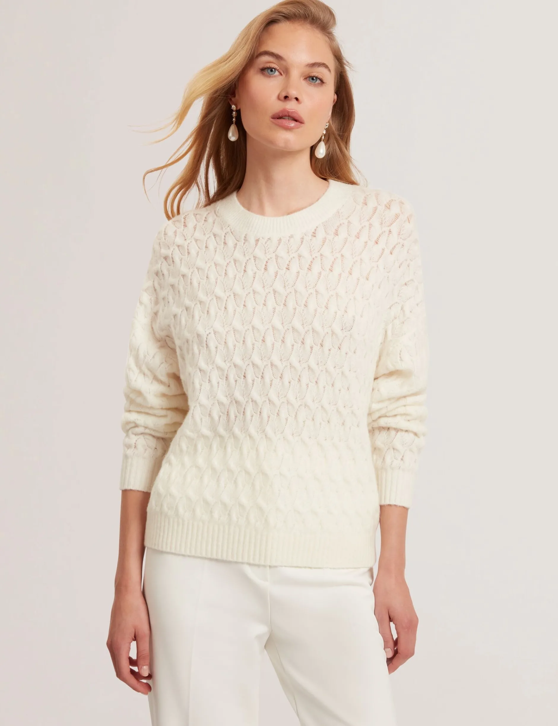 Pointelle Zopfstrickpullover aus Wolle