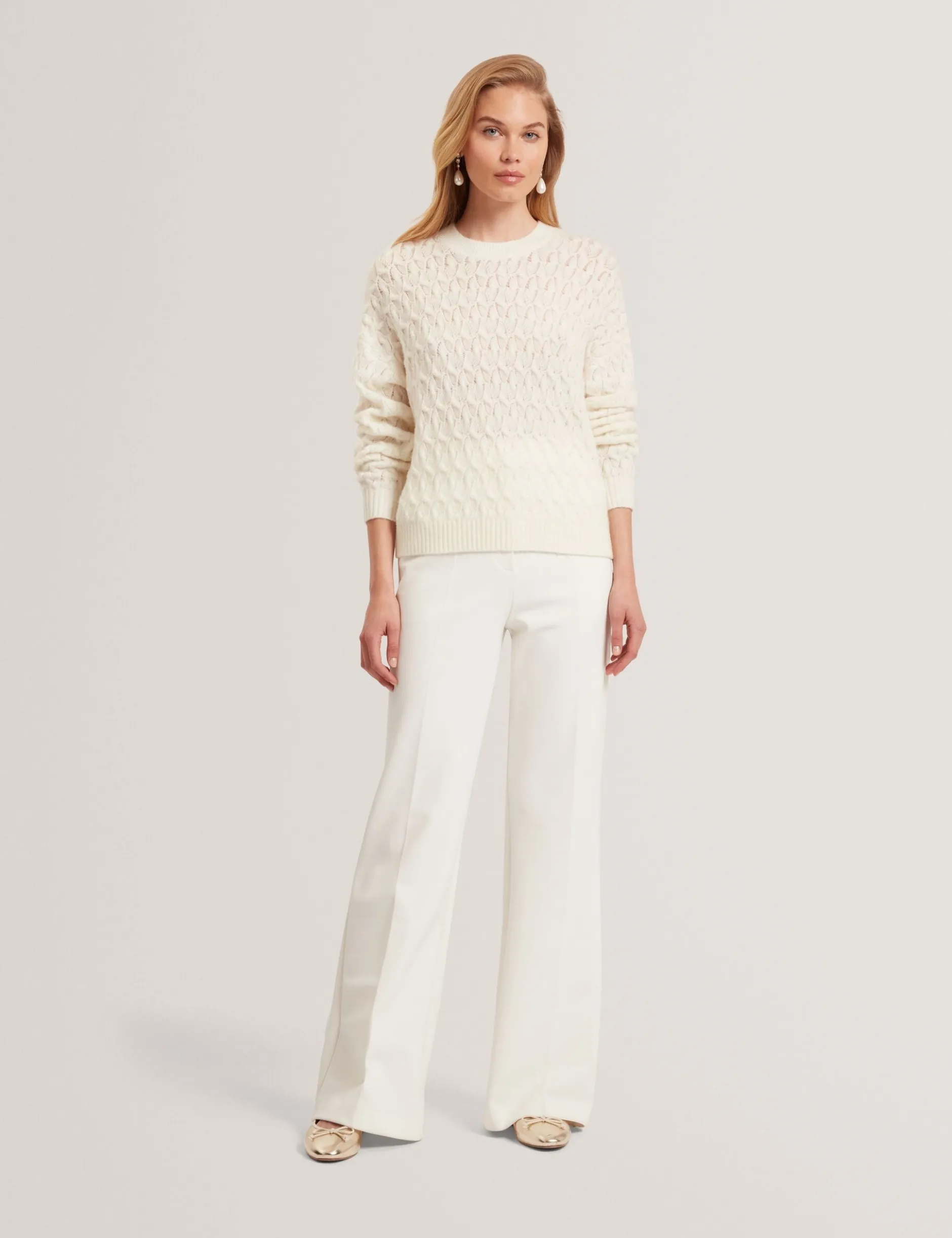 Pointelle Zopfstrickpullover aus Wolle