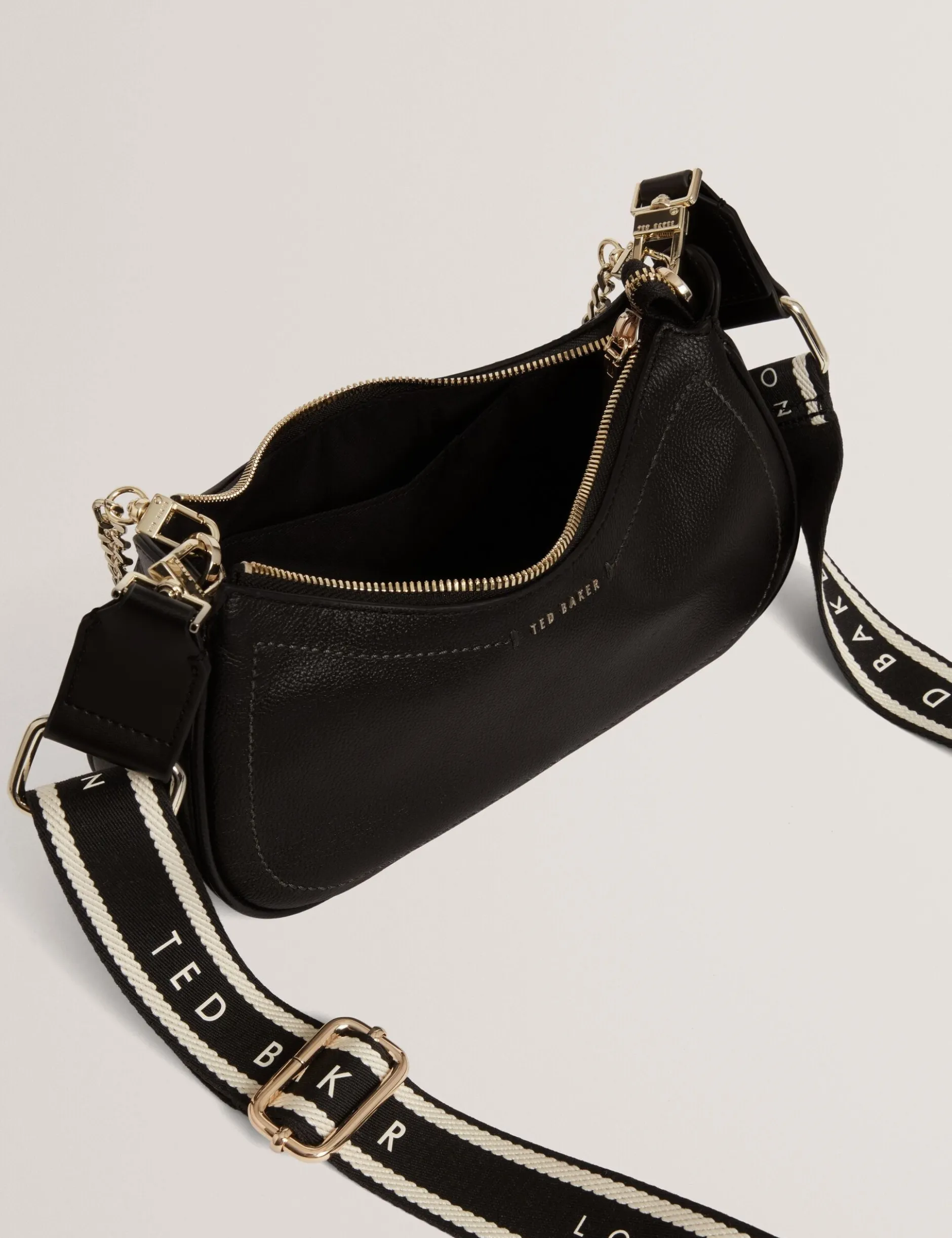 Schultertasche aus Leder mit Gurtband