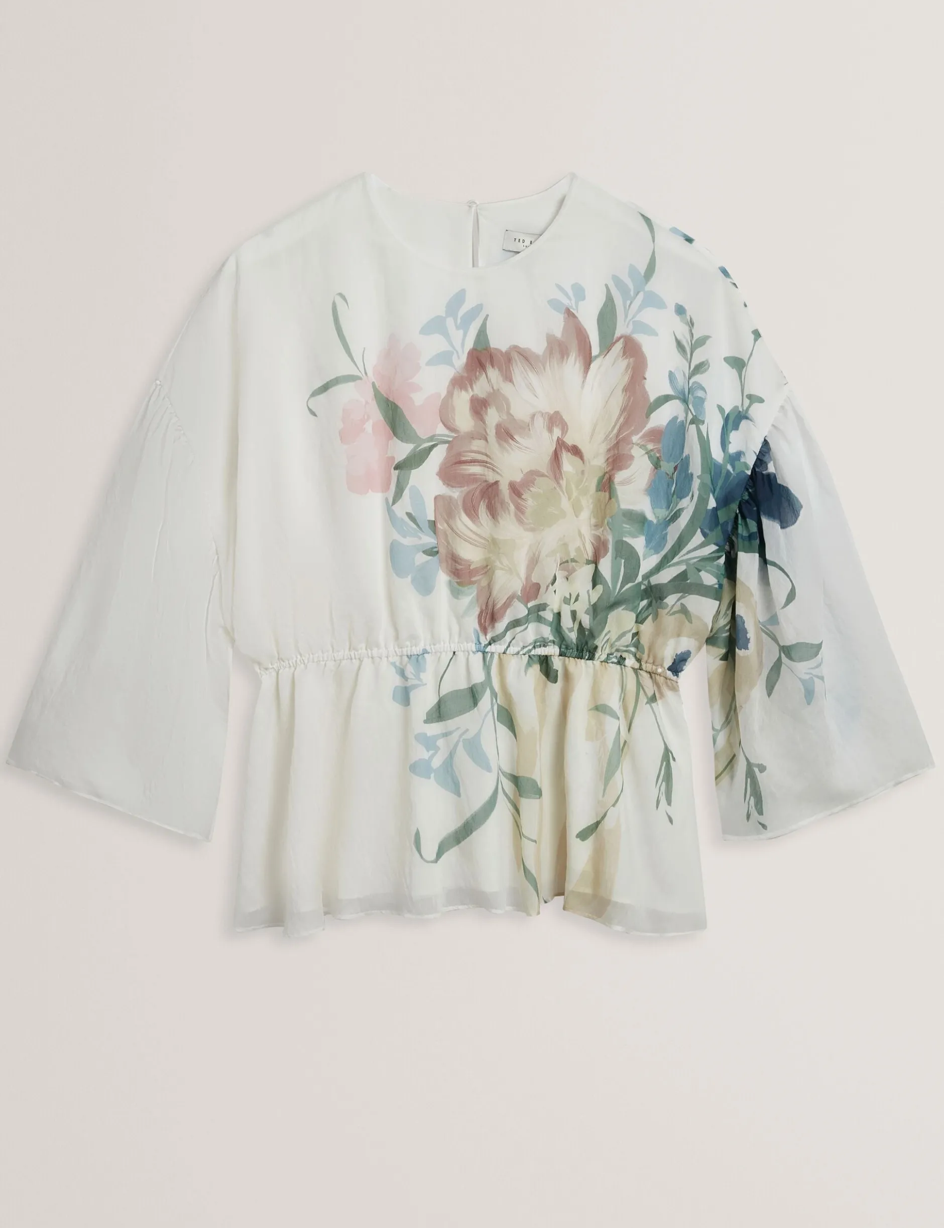 Soft Blooms Puff Sleeve Peplum Top