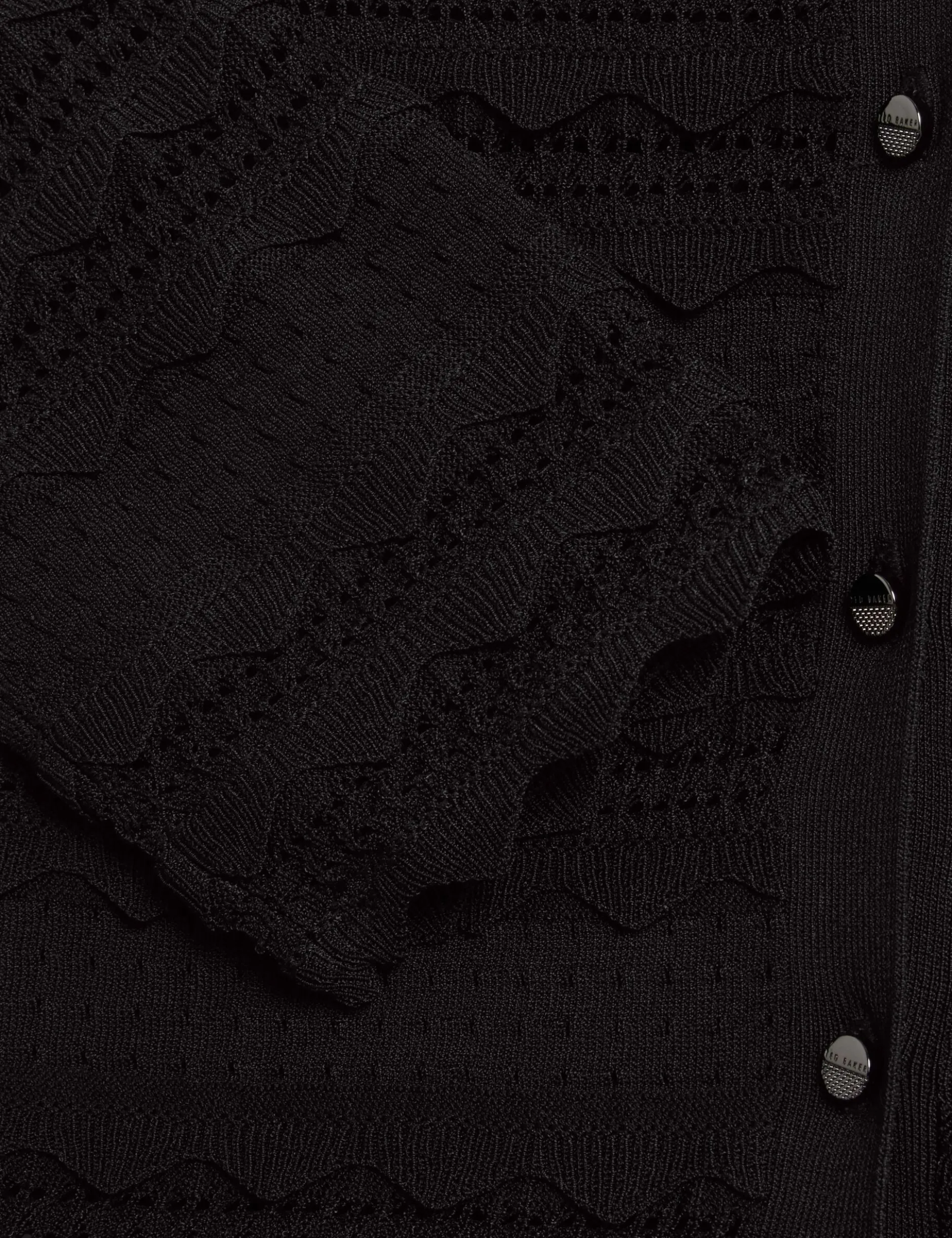 Strickjacke mit Rüschenbesatz
