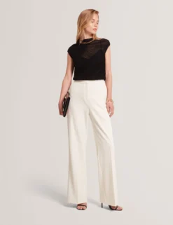 Top aus strukturiertem Strick mit transparentem Einsatz