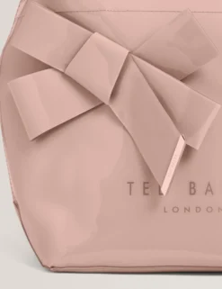 Tragetasche mit kleinem Knoten-Schleifen-Vinyl-Symbol